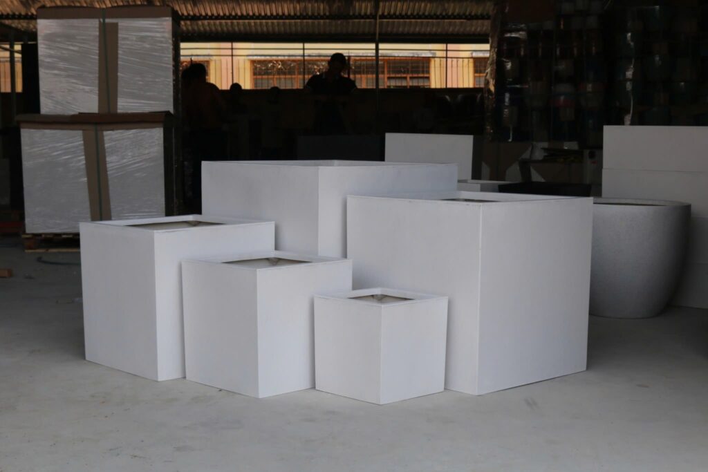 Commercial planters manufacturer in Vietnam supplying fiberglass and fiber cement planters for hotels resorts offices and landscaping projects