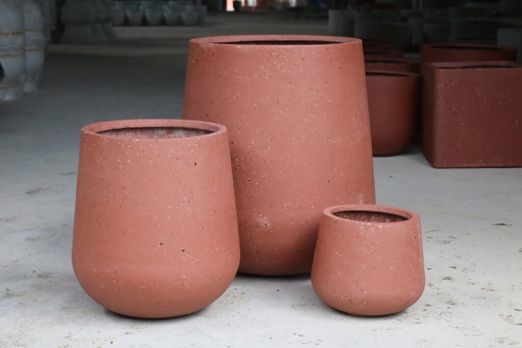 Hotel planters manufacturer in Vietnam supplying fiberglass and fiber cement planters for hotels and resorts