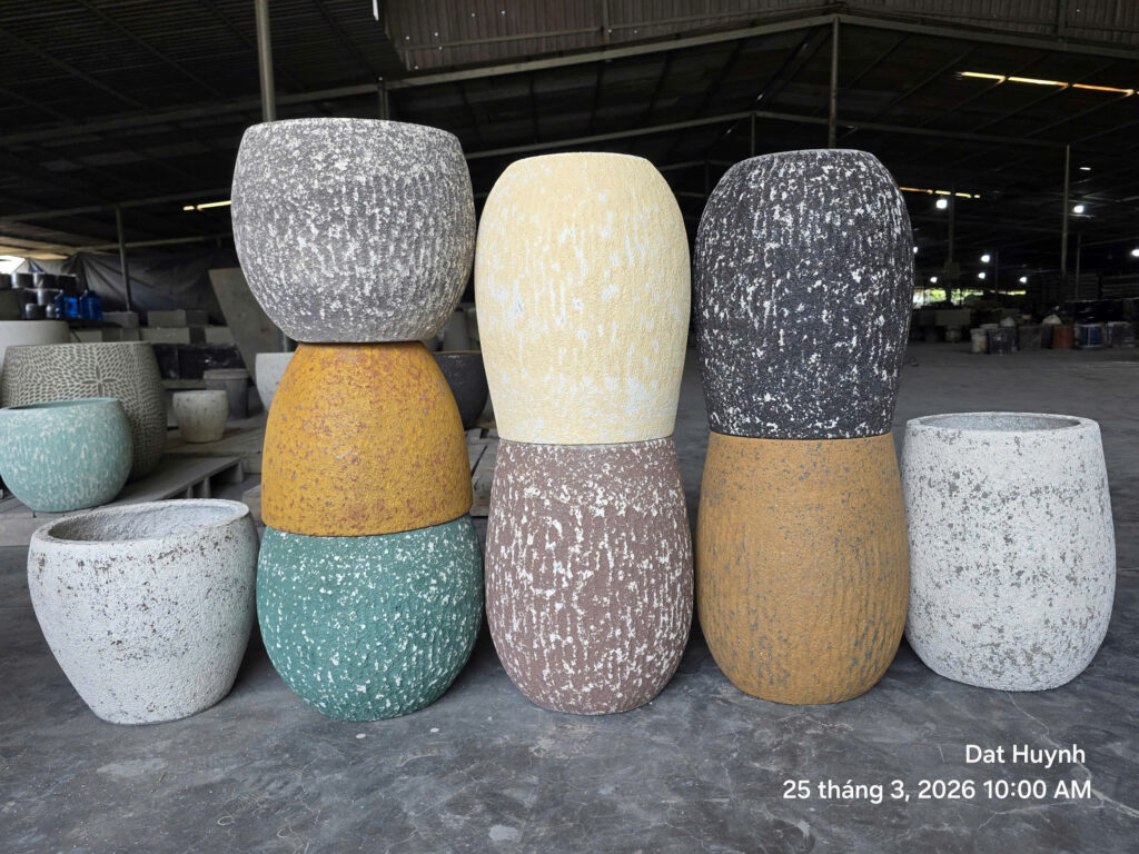 Lightweight fiber cement planters manufactured in Vietnam for commercial hospitality and landscape projects