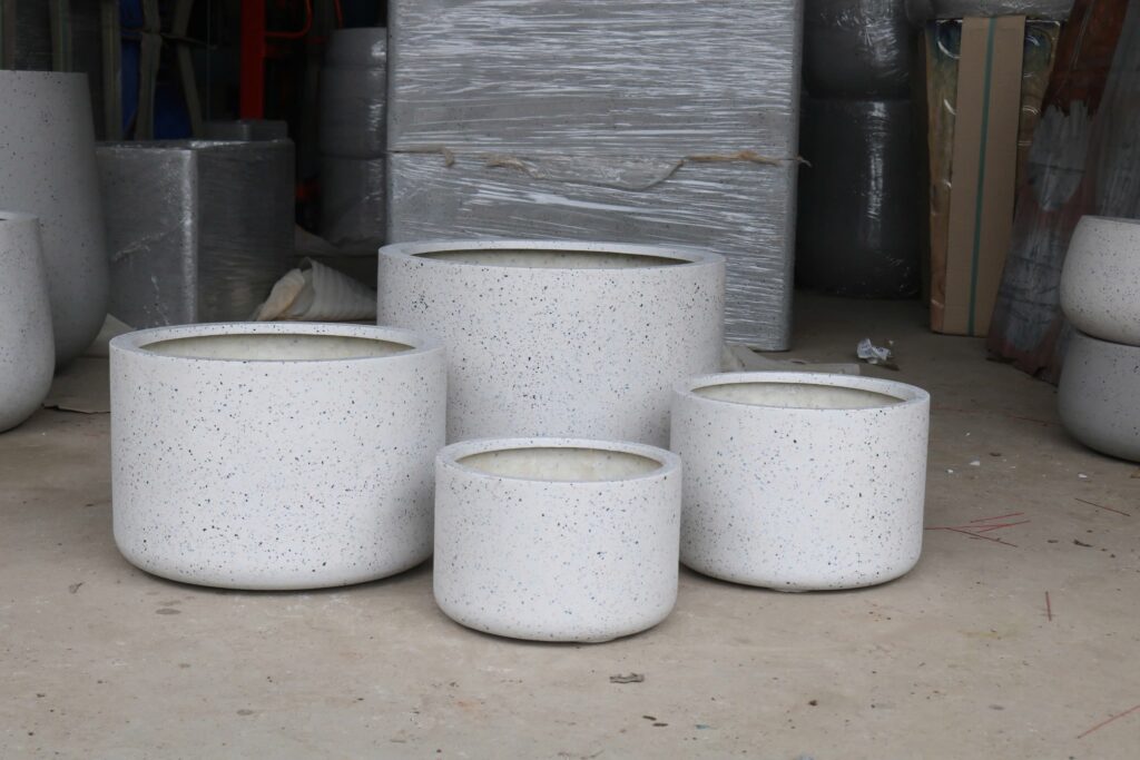 Lightweight pots and planters manufactured in Vietnam using fiberglass and fiber cement materials