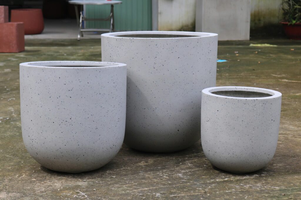 Lightweight terrazzo planters manufactured in Vietnam for hospitality commercial and landscape projects