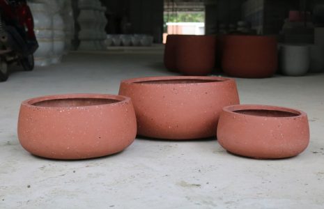 Lightweight fiberglass planters manufactured in Vietnam for commercial hospitality and landscape projects